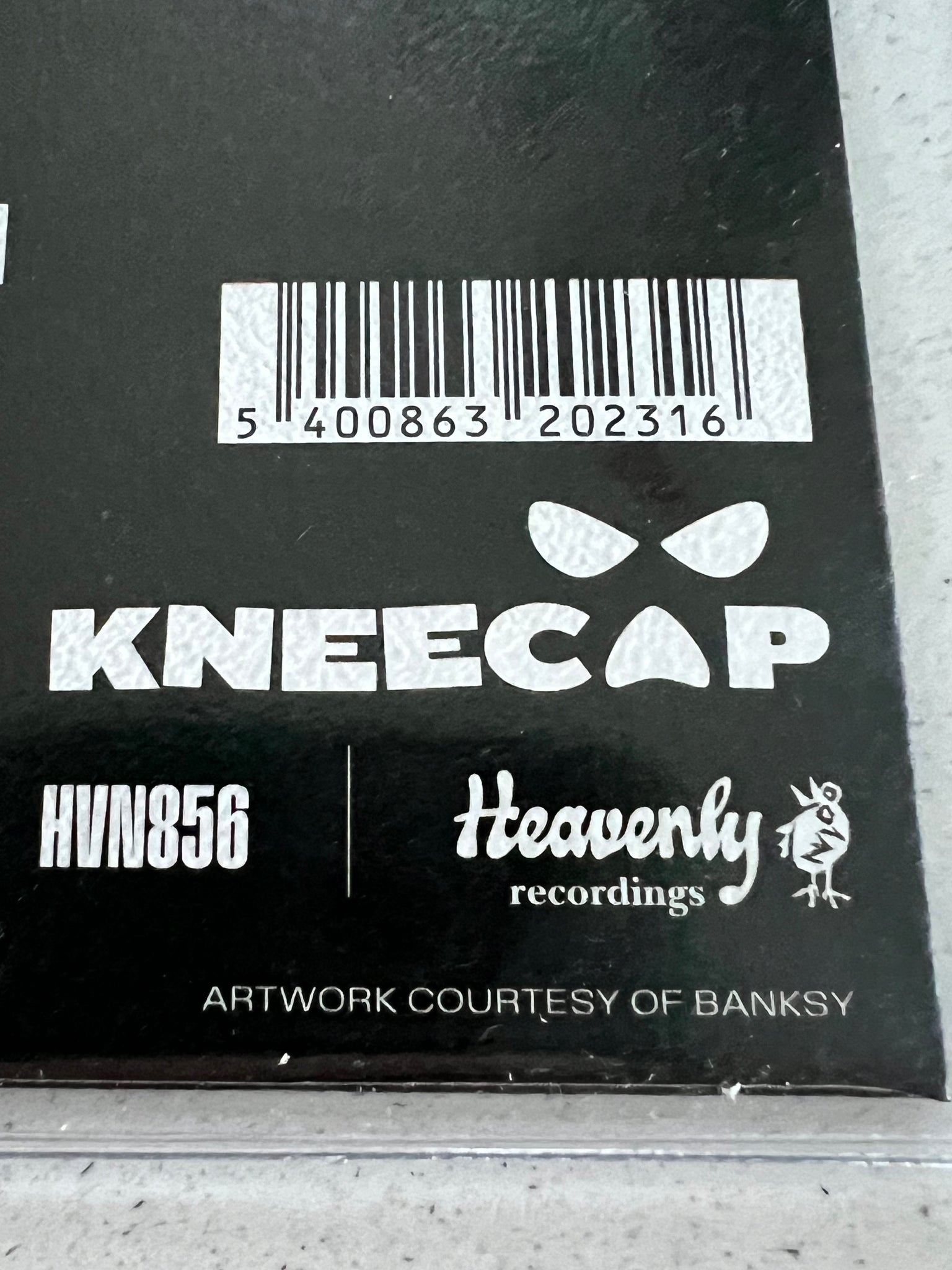 KNEECAP BANKSY SLEEVE SINGLE NO COMMENT 7" IN STOCK